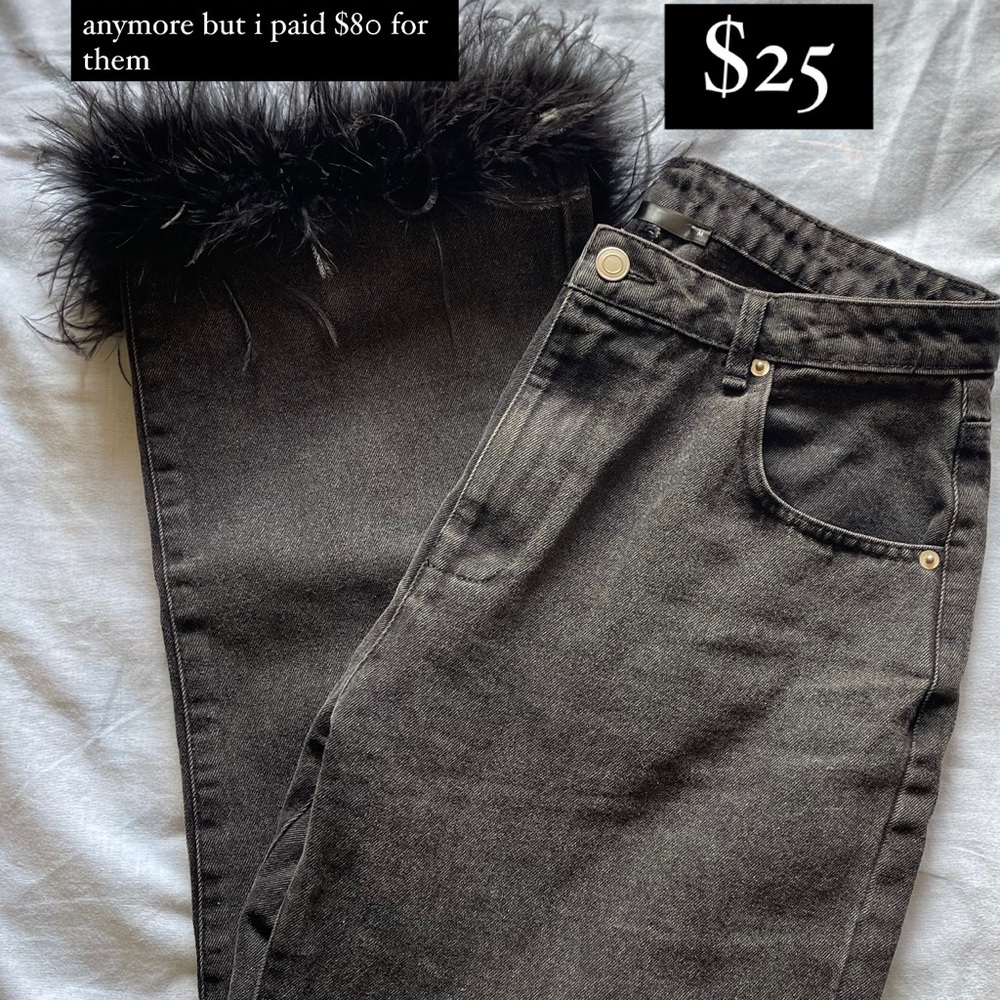 In great condition ShopMala jeans with a cute little fluff at the bottom